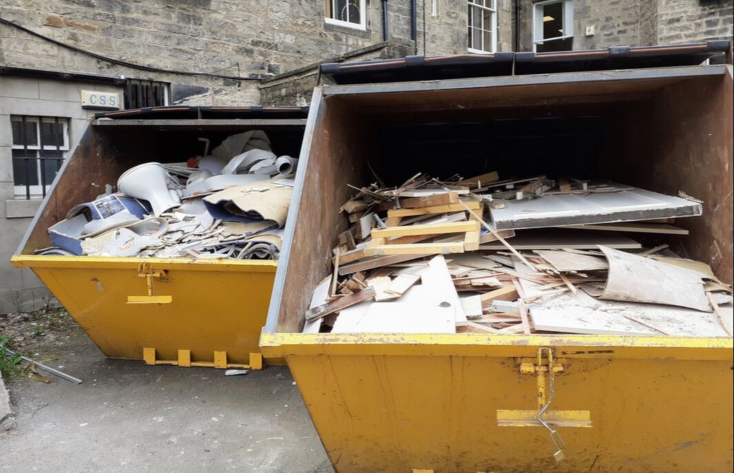 Book enclosed and lockable skip hire near you in Scotland, Wales, or England, click for an enclosed skip hire quote
